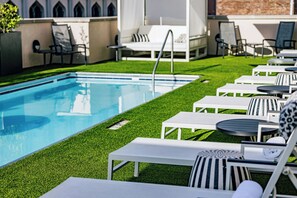 Outdoor pool, open 7:30 AM to 6:30 PM, sun loungers