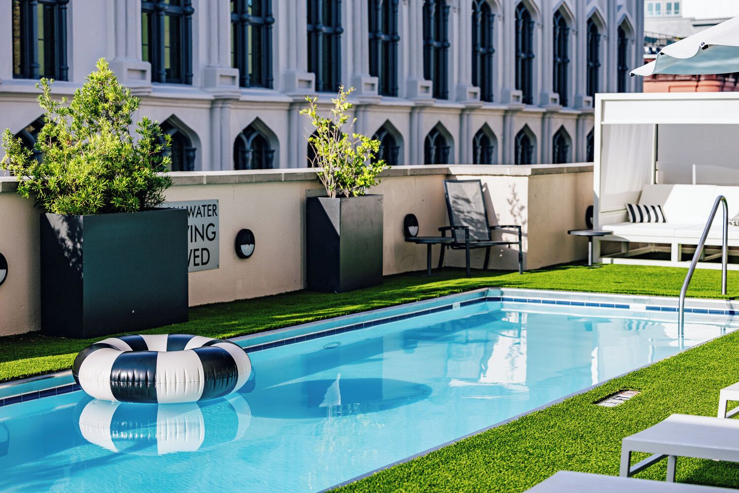 outdoor pool, open 7:30 am to 6:30 pm, pool loungers