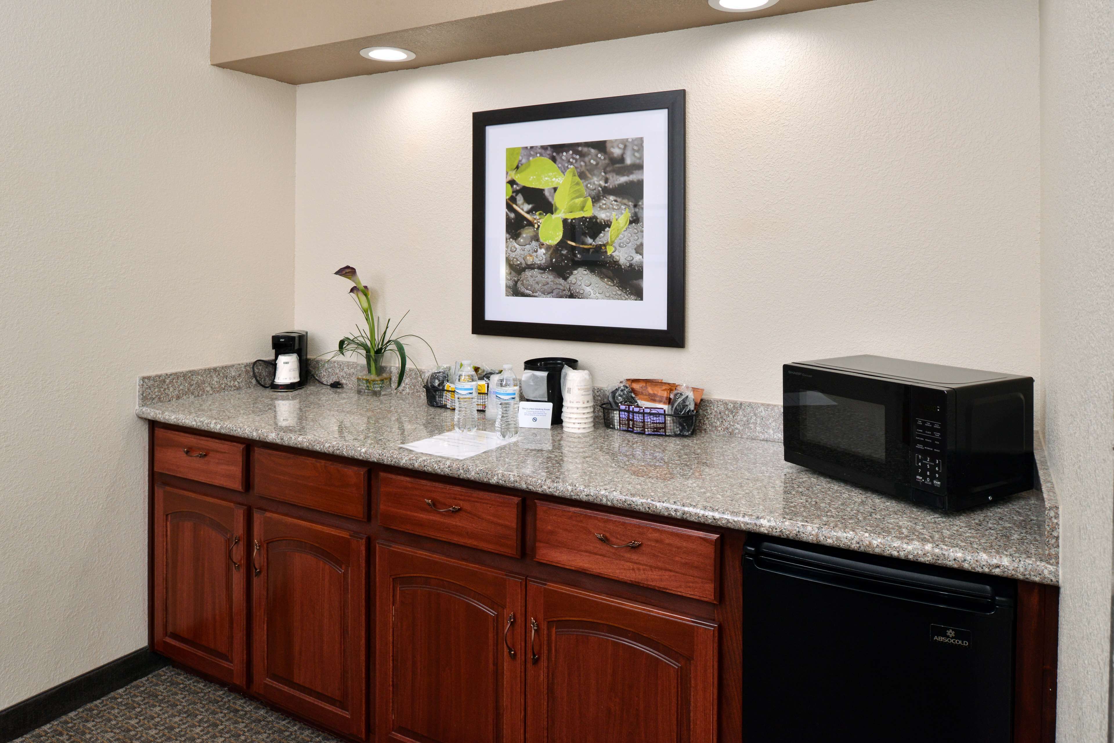 desk, laptop workspace, iron/ironing board, cots/infant beds