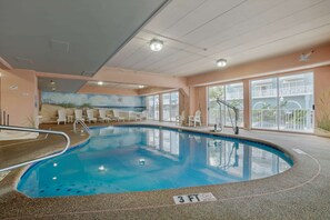 Indoor pool, seasonal outdoor pool, pool umbrellas, sun loungers