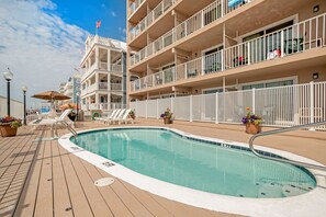Indoor pool, seasonal outdoor pool, pool umbrellas, pool loungers