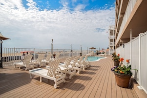 Indoor pool, seasonal outdoor pool, pool umbrellas, sun loungers