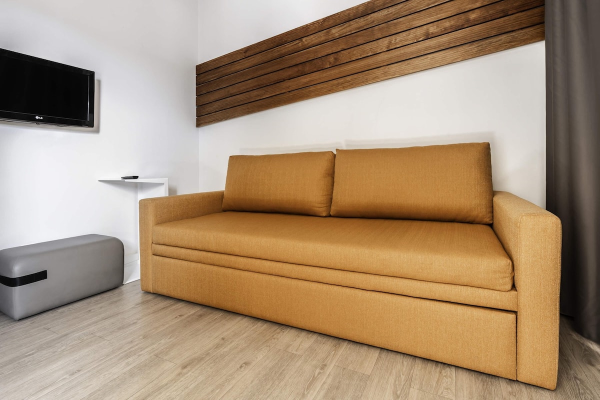 Suite, 1 cama matrimonial y sofá cama | 1 habitación, minibar y caja de seguridad en la habitación