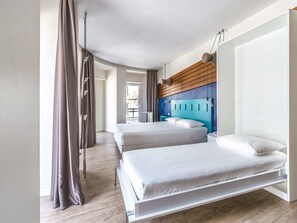 Premium bedding, down comforters, in-room safe, individually decorated