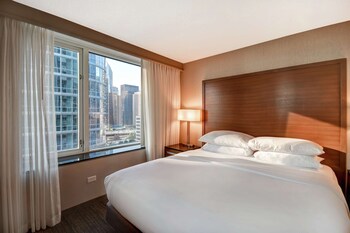 Hypo-allergenic bedding, in-room safe, desk, iron/ironing board at Embassy Suites by Hilton Chicago Downtown Magnificent Mile