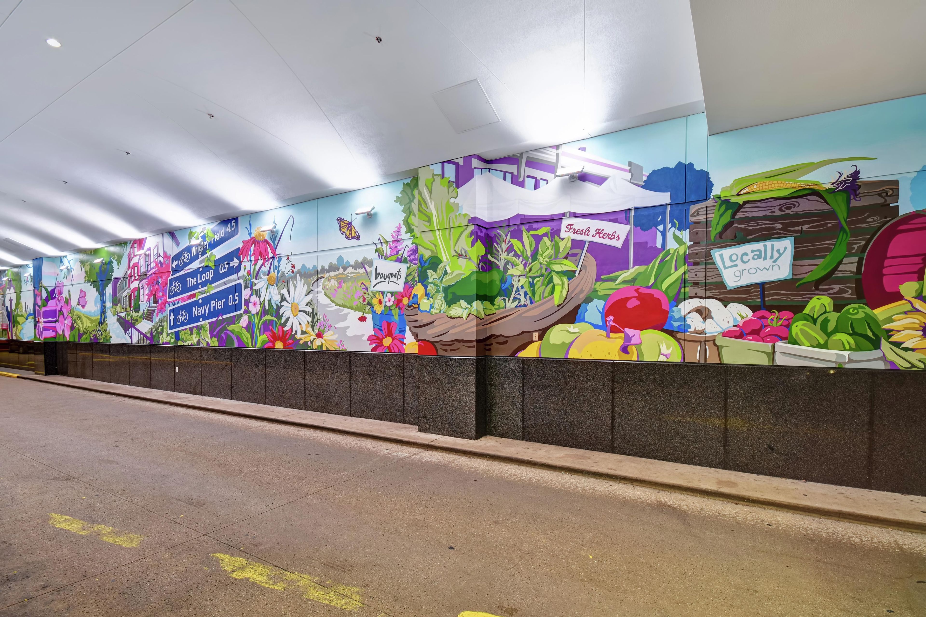 A vibrant mural with directional signs and a variety of plants.
