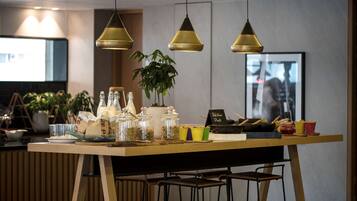 Daily buffet breakfast (USD 15 per person)