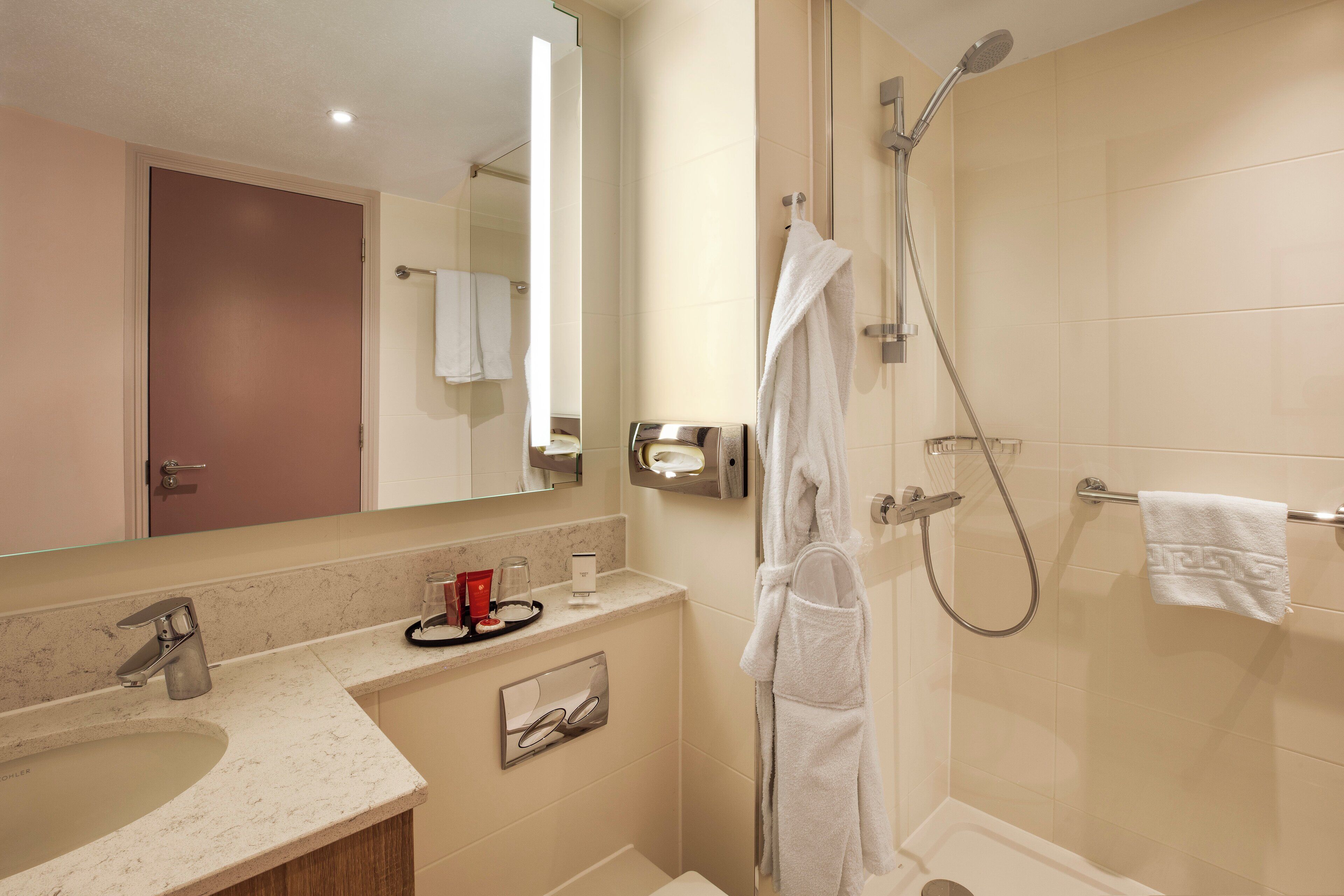 shower, free toiletries, hair dryer, towels