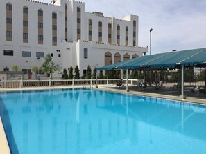 Outdoor pool, open 6:30 AM to 9:30 PM, pool umbrellas, sun loungers
