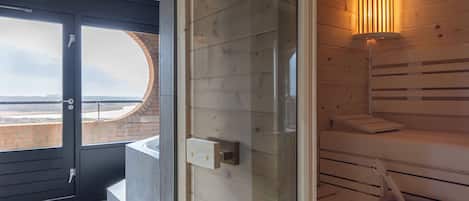 Wellness Suite (pets not allowed) | Bathroom | Combined shower/tub, eco-friendly toiletries, hair dryer, towels