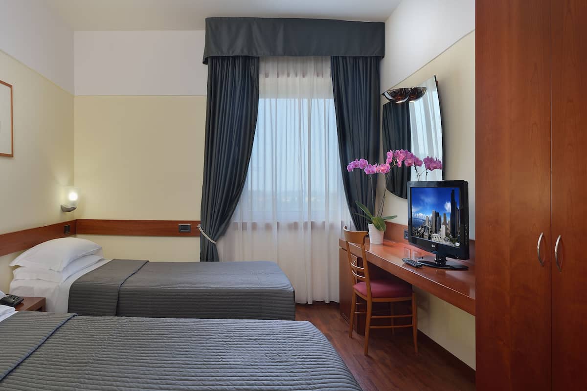 Down duvets, minibar, in-room safe, desk
