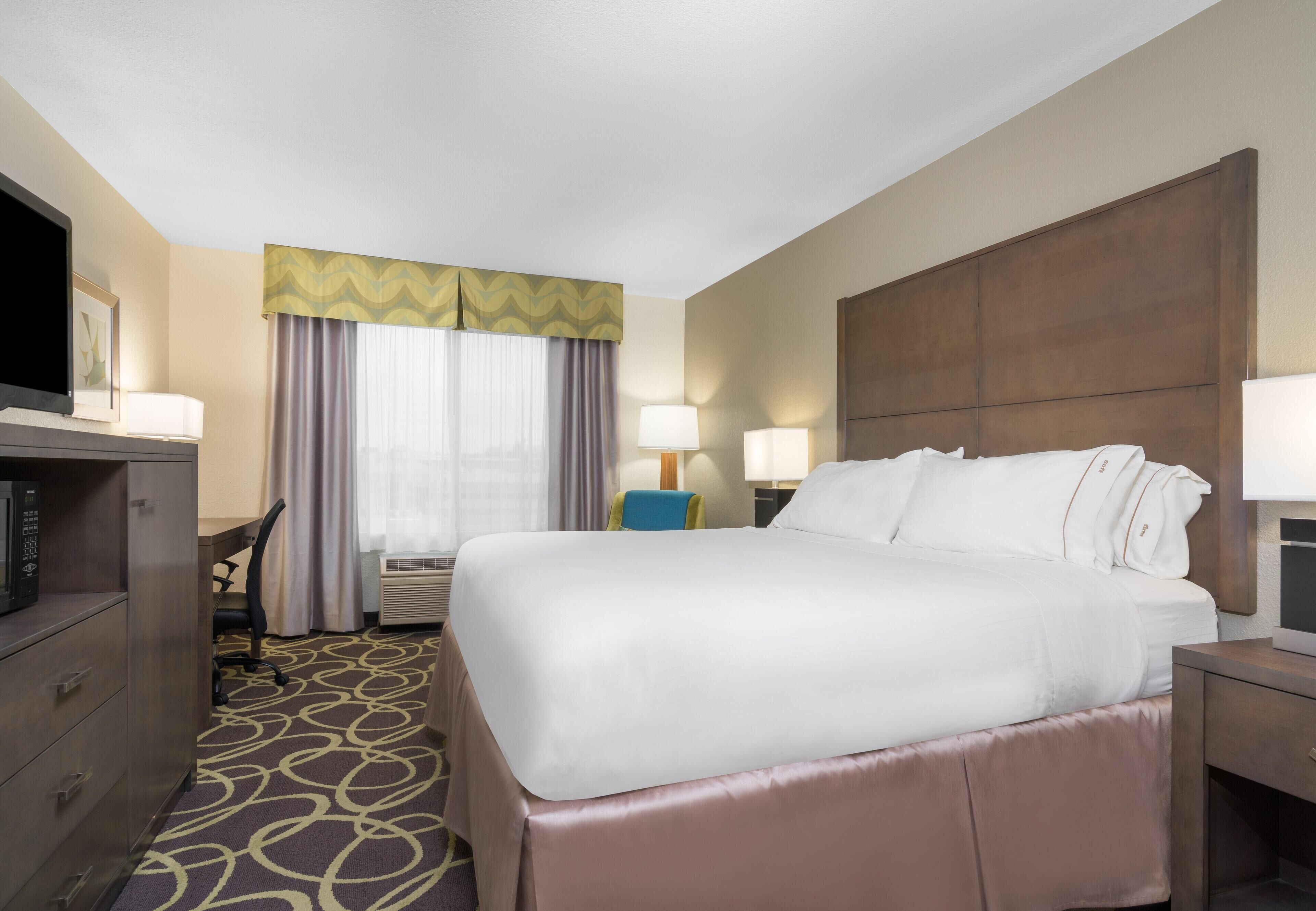 Premium bedding, down comforters, desk, blackout drapes