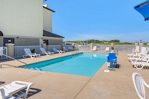 Seasonal outdoor pool, open 10:00 AM to 10:00 PM, sun loungers
