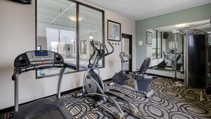 A gym with treadmills, elliptical machines, and a stationary bike. - Best Western Lake Cumberland Inn (Monticello)
