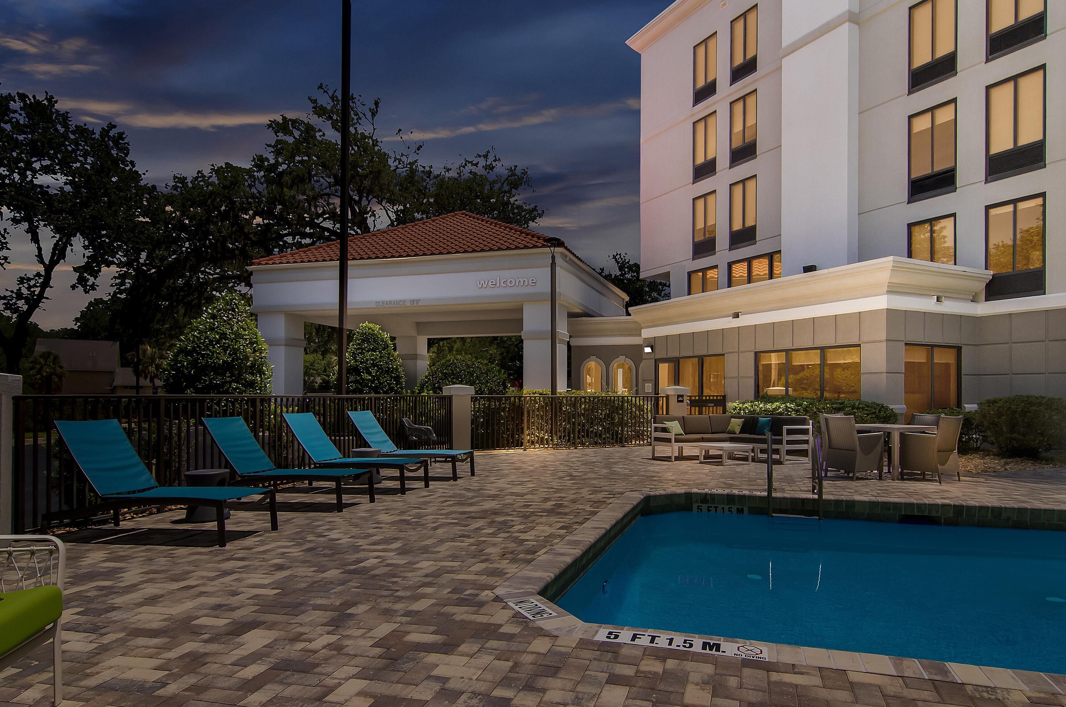 outdoor pool, open 9 am to 10:00 pm, pool loungers