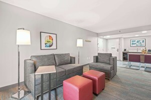 Suite, 1 King Bed, Non Smoking | Living area | 32-inch LCD TV with cable channels, TV, pay movies