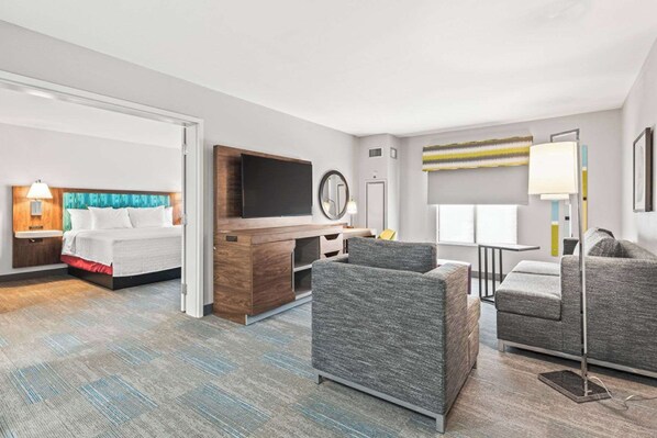 Suite, 1 King Bed, Non Smoking | Living area | 32-inch LCD TV with cable channels, TV, pay movies