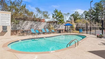 Outdoor pool, pool umbrellas, sun loungers
