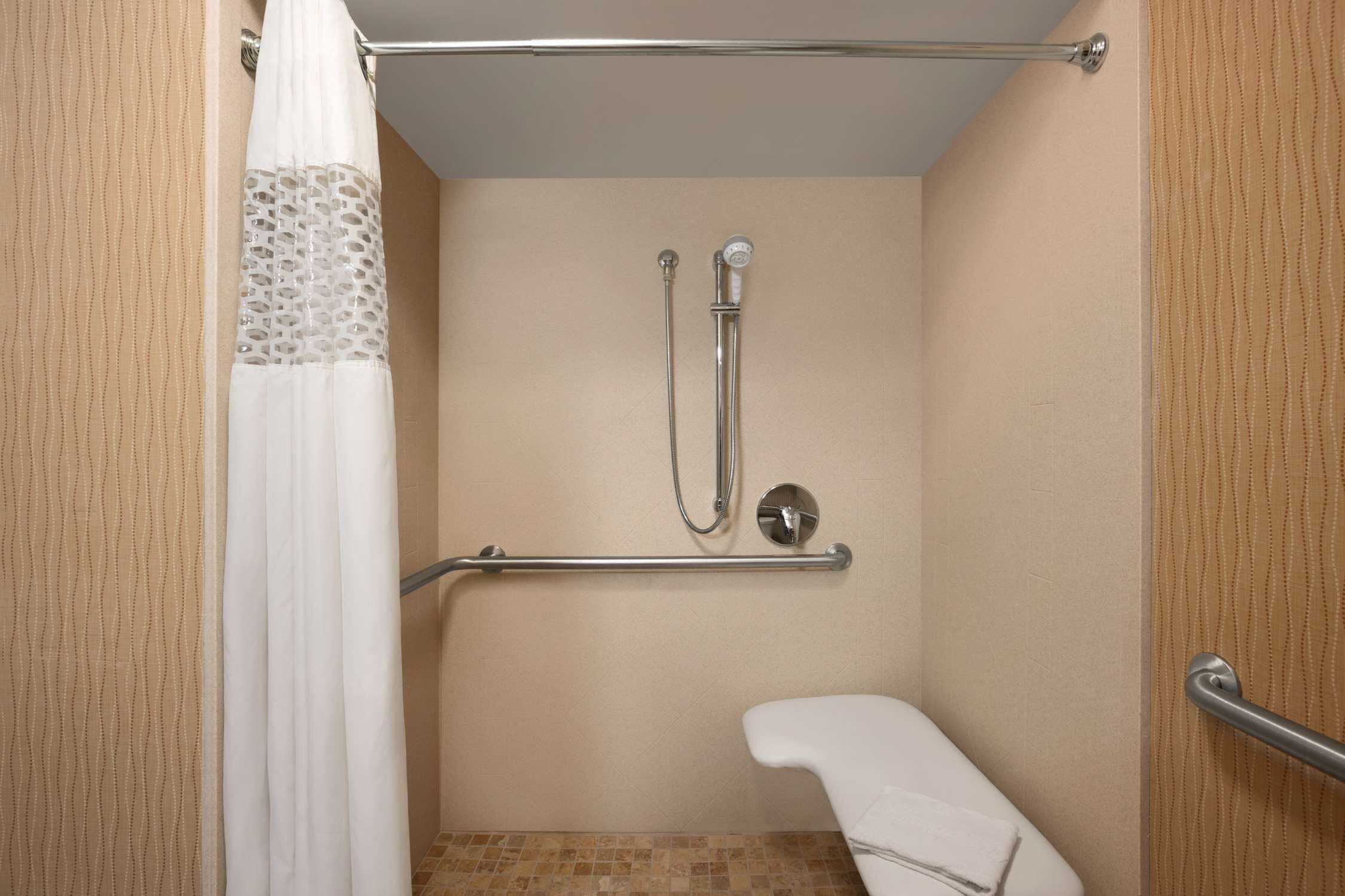 combined shower/bathtub, free toiletries, hair dryer, towels