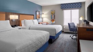 A hotel room with two beds, a desk, a chair, a TV, and a window with a view. - Hampton Inn Ottawa (Starved Rock Area) (Ottawa)