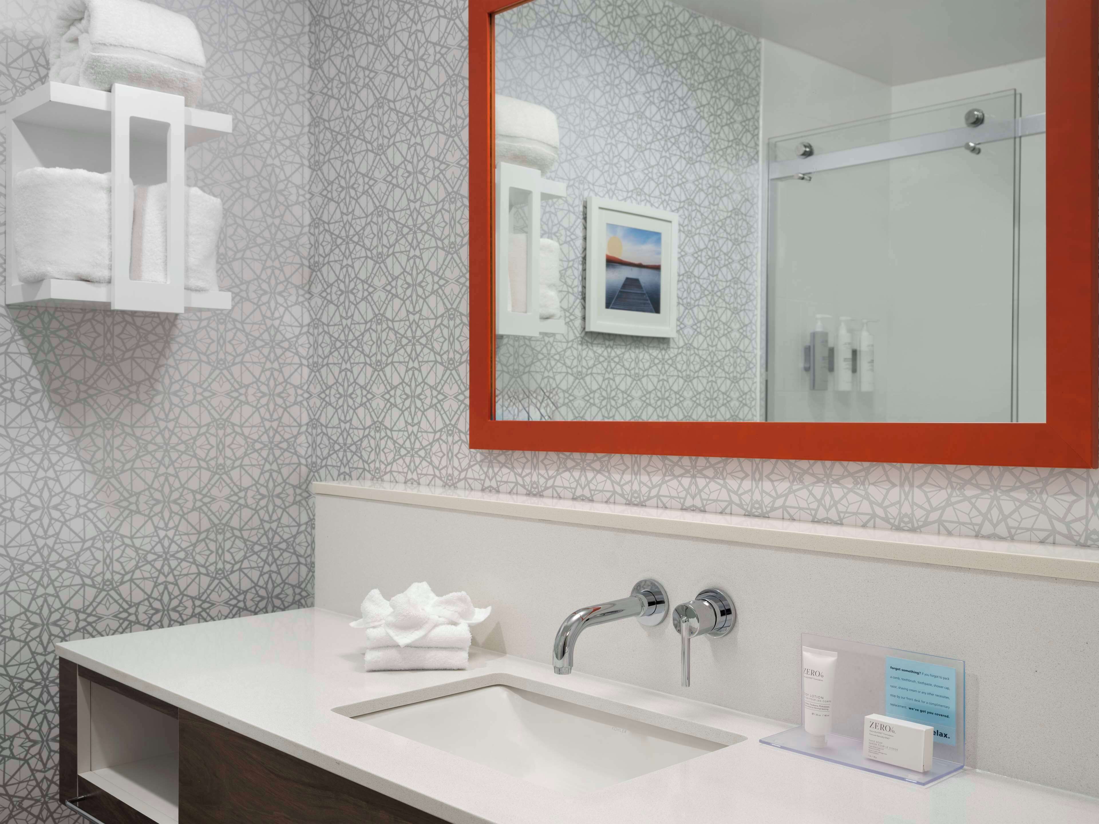 hair dryer, towels, soap, shampoo