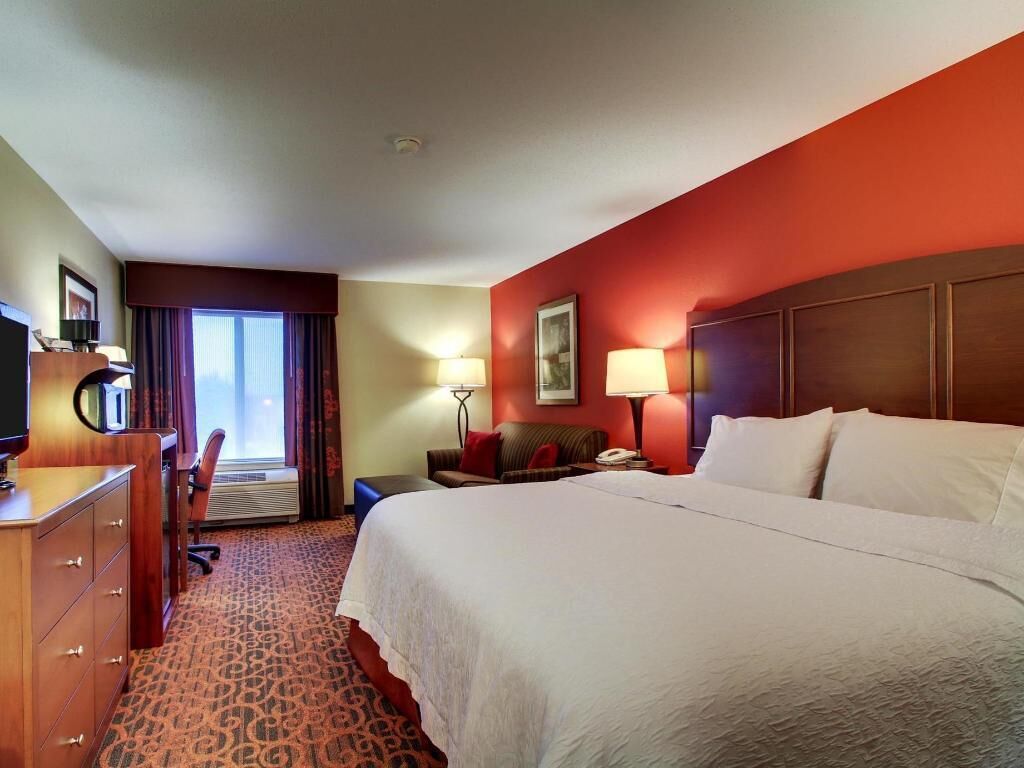 Desk, laptop workspace, blackout curtains, iron/ironing board