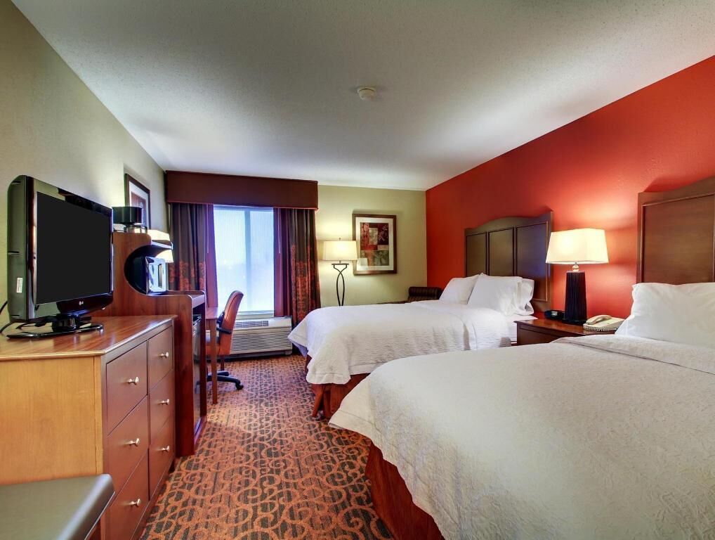 Desk, laptop workspace, blackout curtains, iron/ironing board