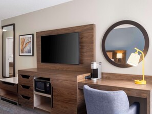 Desk, laptop workspace, blackout drapes, iron/ironing board