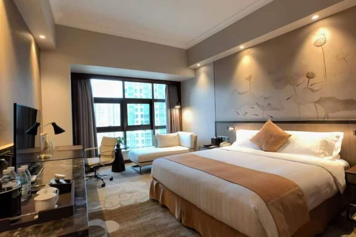 Couette en duvet d'oie, coffres-forts dans les chambres, bureau