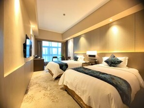 Deluxe Twin Room | Down comforters, in-room safe, desk, blackout drapes