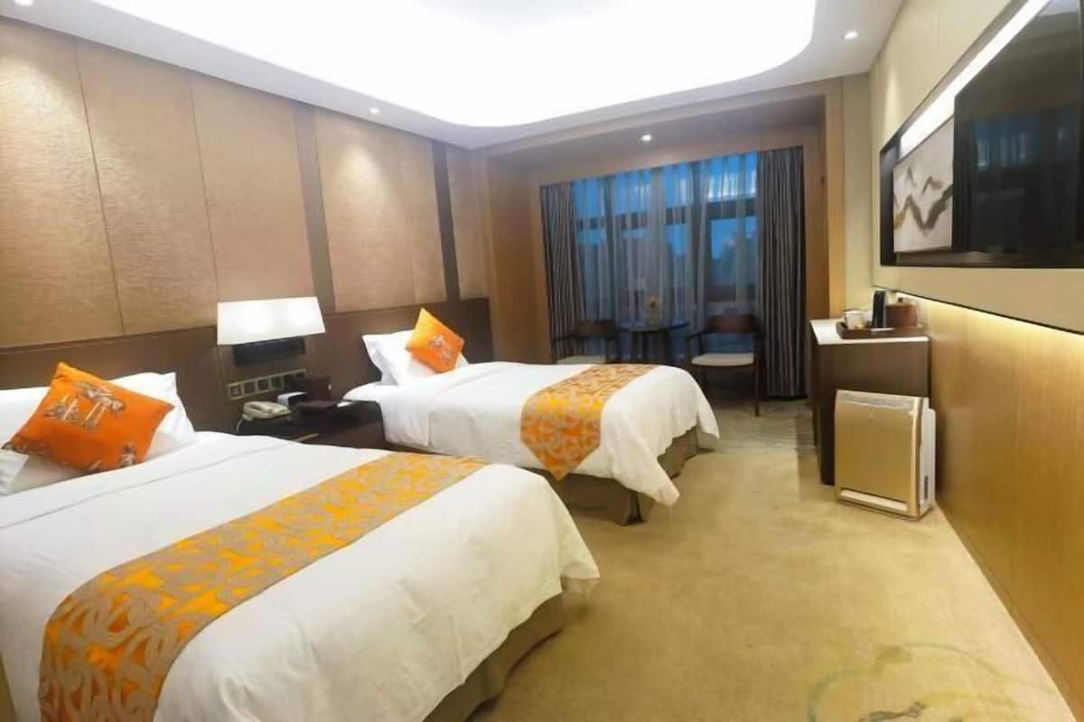 Couette en duvet d'oie, coffres-forts dans les chambres, bureau