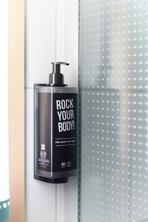 Shower, eco-friendly toiletries, hair dryer, towels