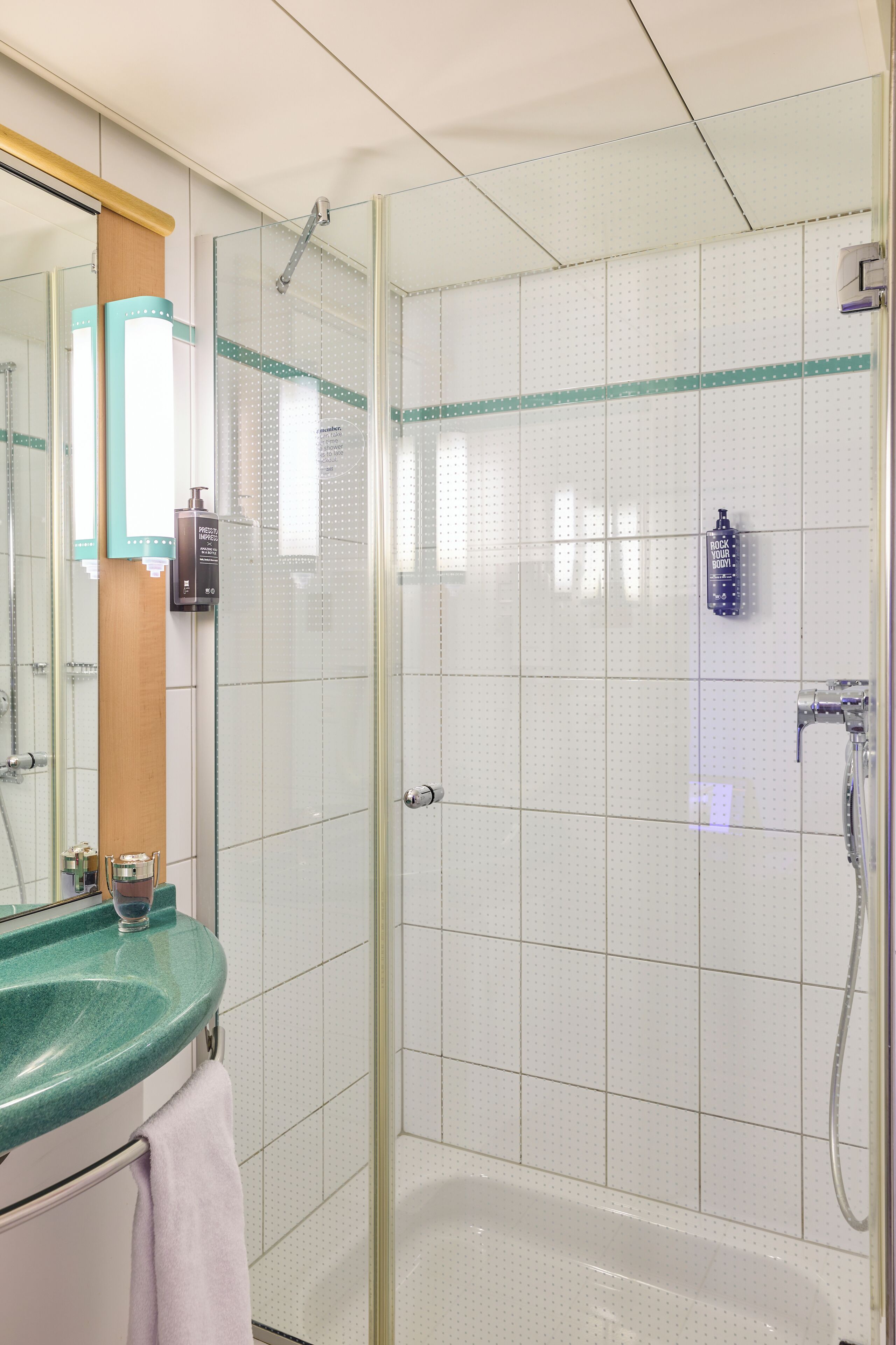 Shower, eco-friendly toiletries, hair dryer, towels