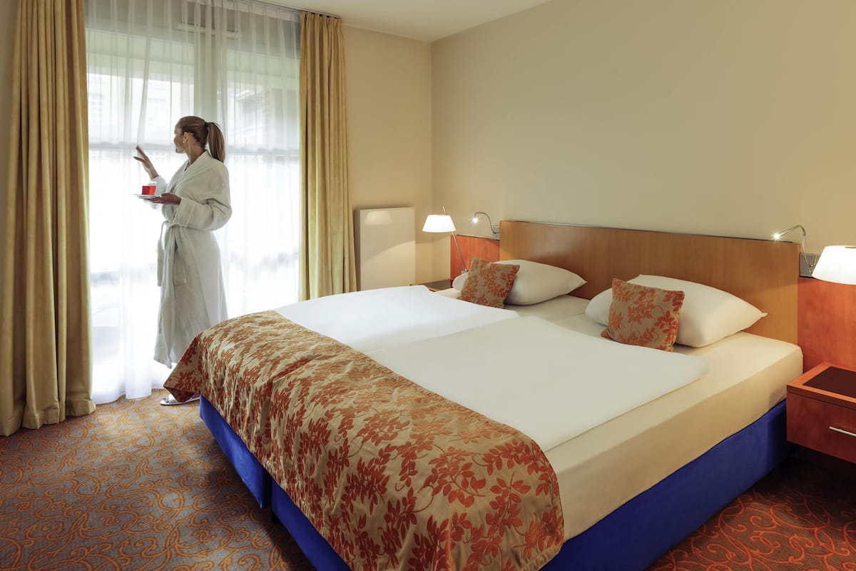 1 habitación, ropa de cama de alta calidad y minibar