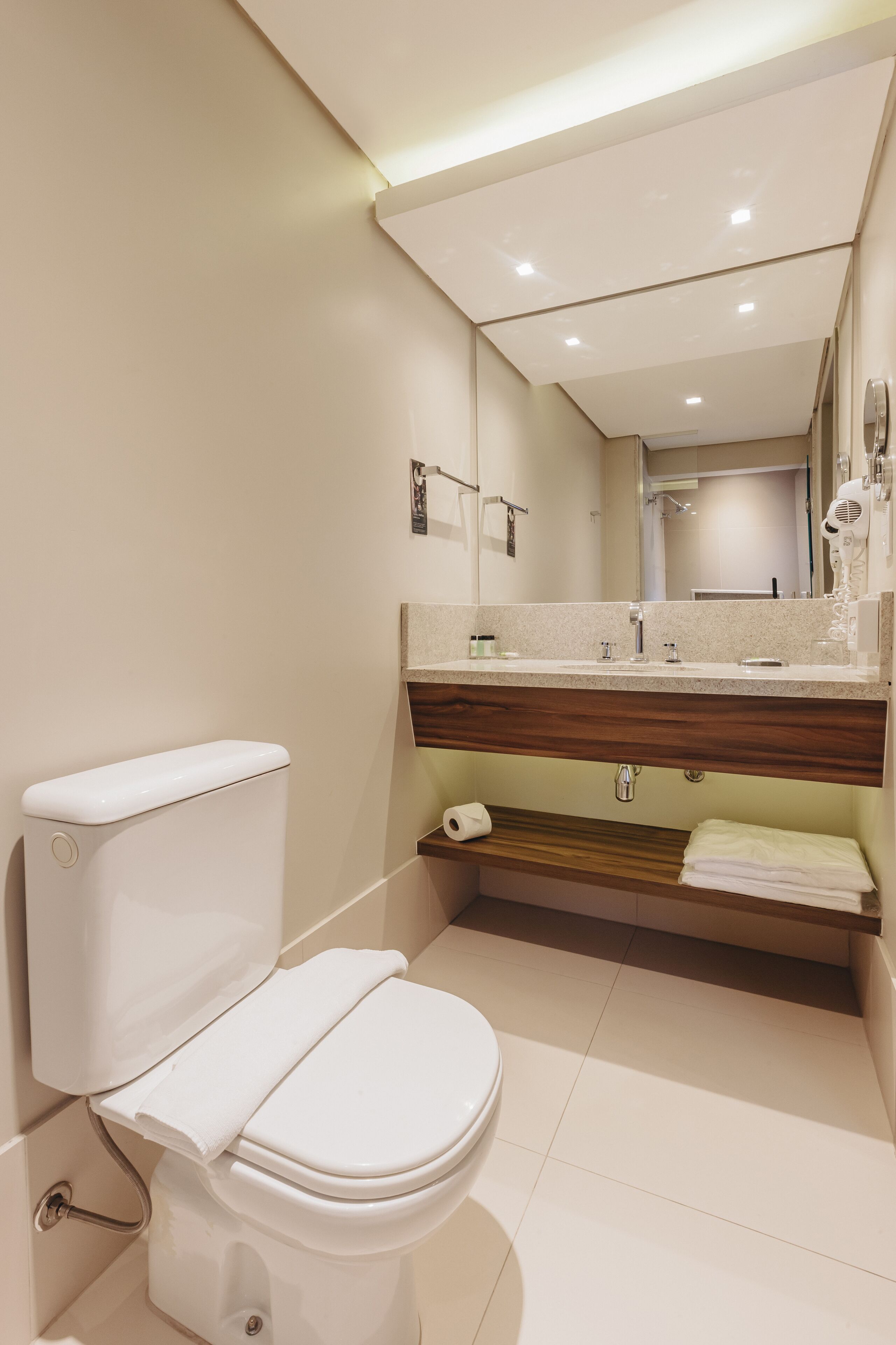 shower, eco-friendly toiletries, hair dryer, towels