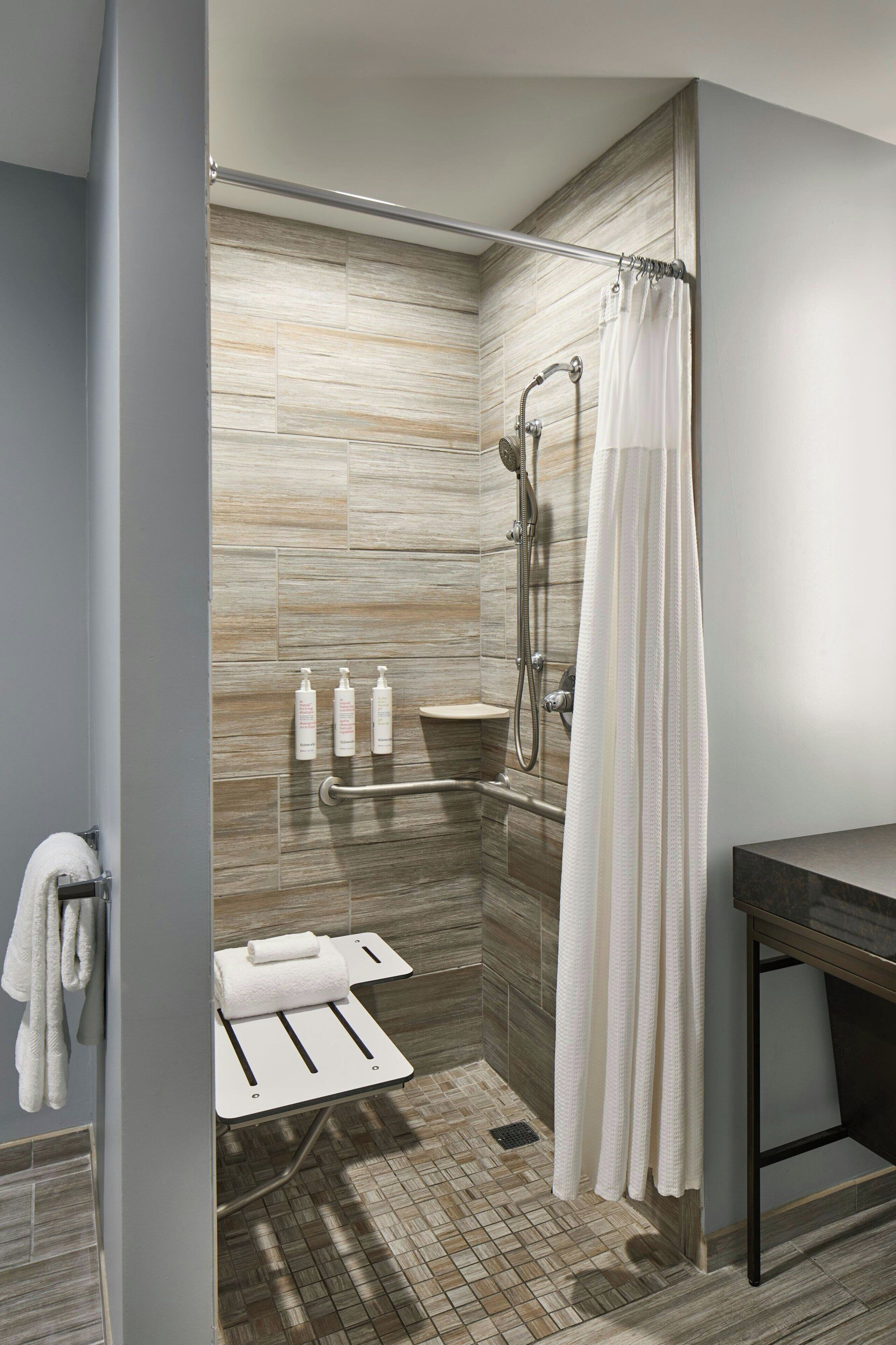 shower, free toiletries, hair dryer, towels