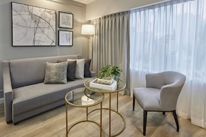Deluxe Room, 1 Queen Bed, City View | Living area | 42-inch LCD TV with cable channels, TV