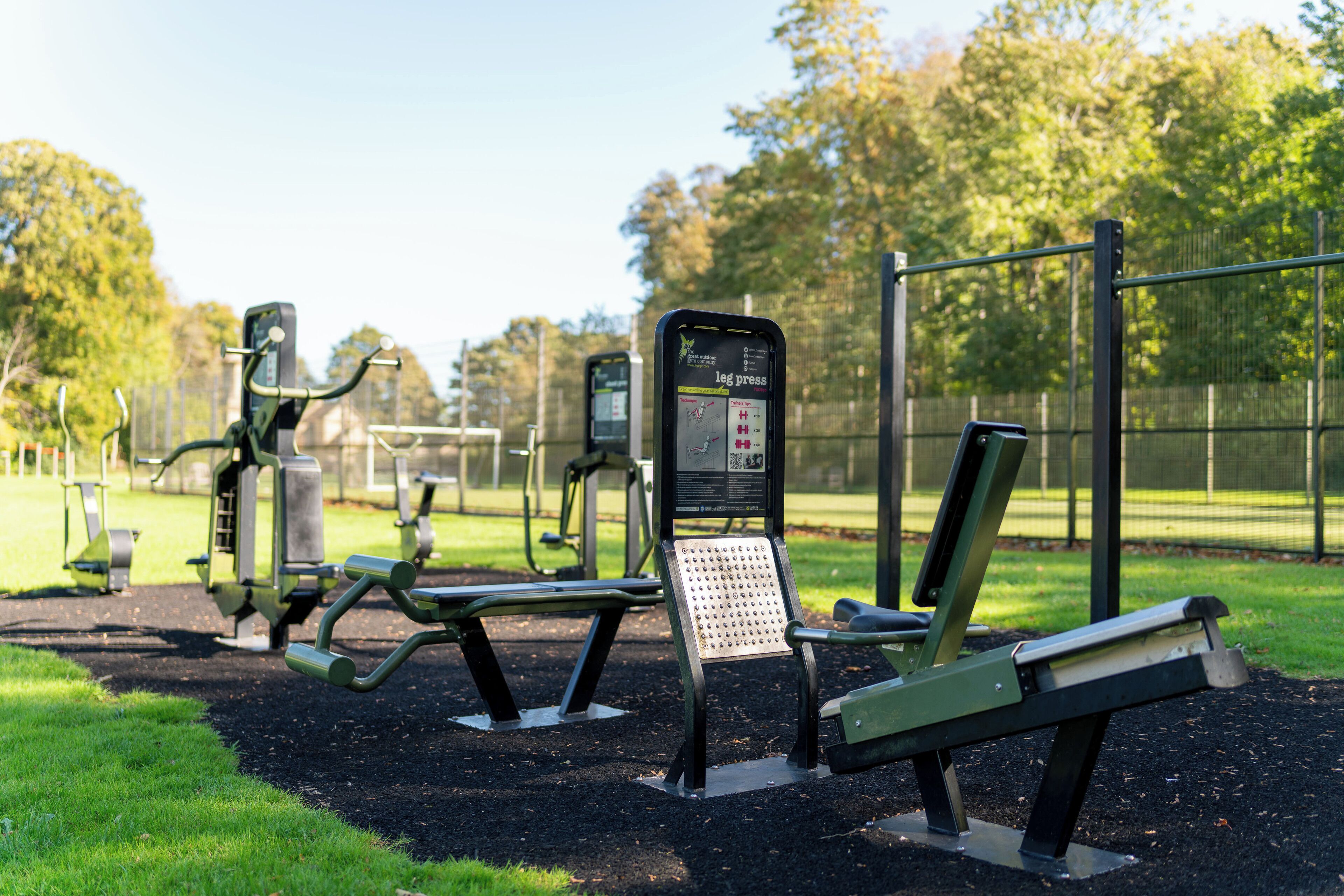 Outdoor exercise equipment in a park.