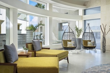 Hotel entrance and lobby at Pier South Resort, Autograph Collection by Marriott
