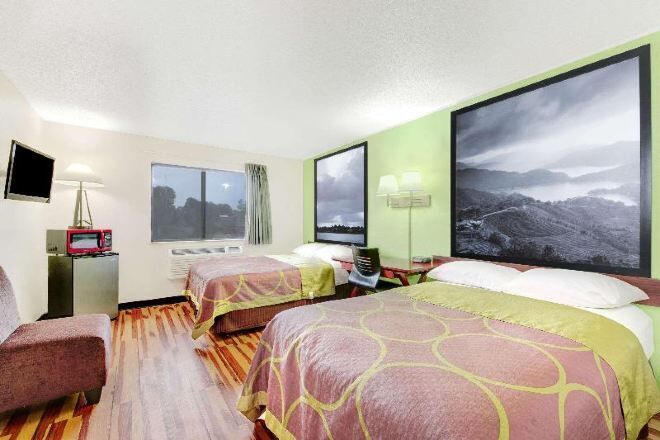 Desk, blackout curtains, iron/ironing board, free cots/infant beds