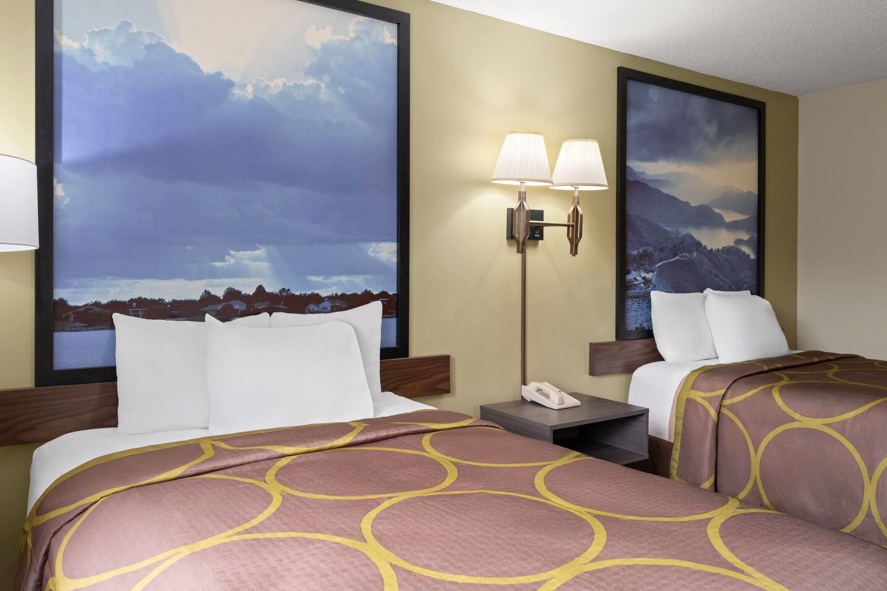 Desk, blackout drapes, iron/ironing board, free cribs/infant beds