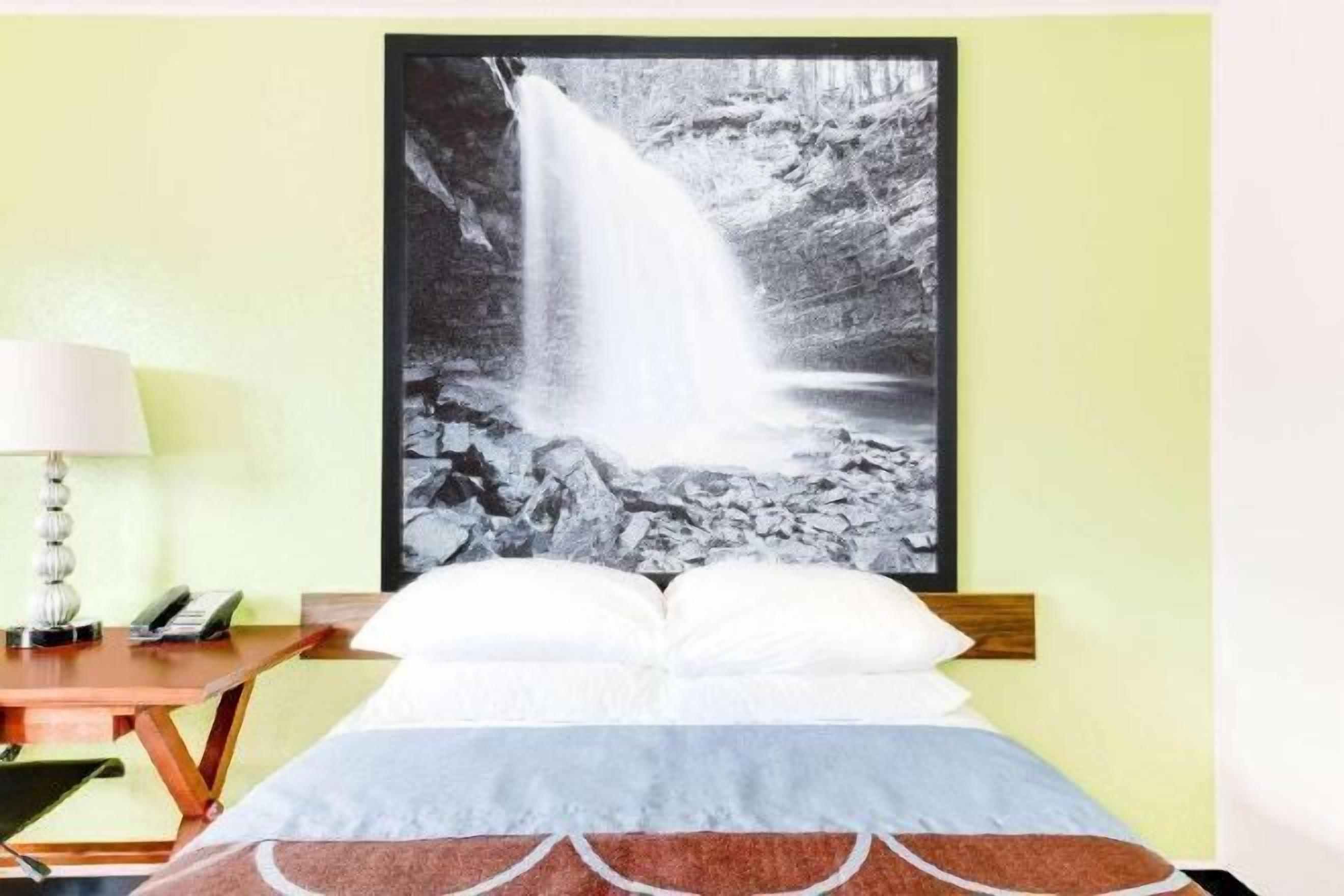 Desk, blackout drapes, iron/ironing board, free cribs/infant beds