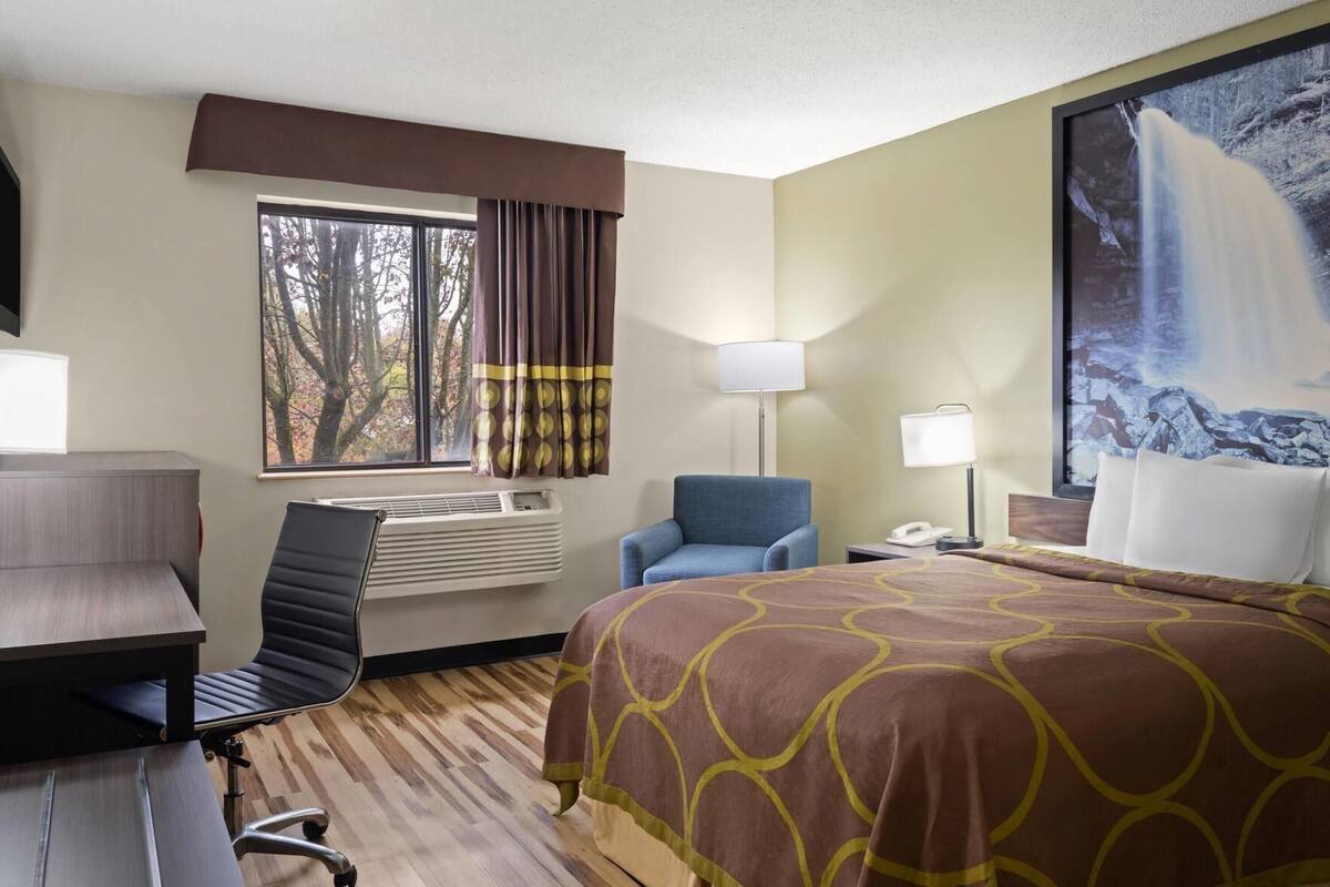 Desk, blackout curtains, iron/ironing board (on request)
