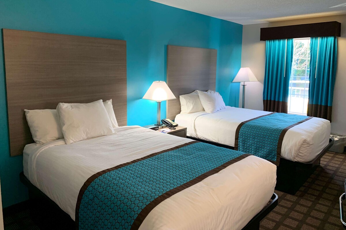 Pillow-top beds, desk, blackout curtains, iron/ironing board