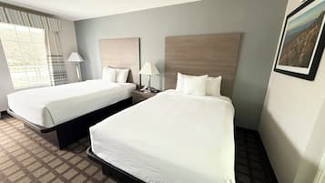 Pillow-top beds, desk, blackout curtains, iron/ironing board