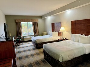 Luxe beddengoed, pillowtop-bedden, een bureau