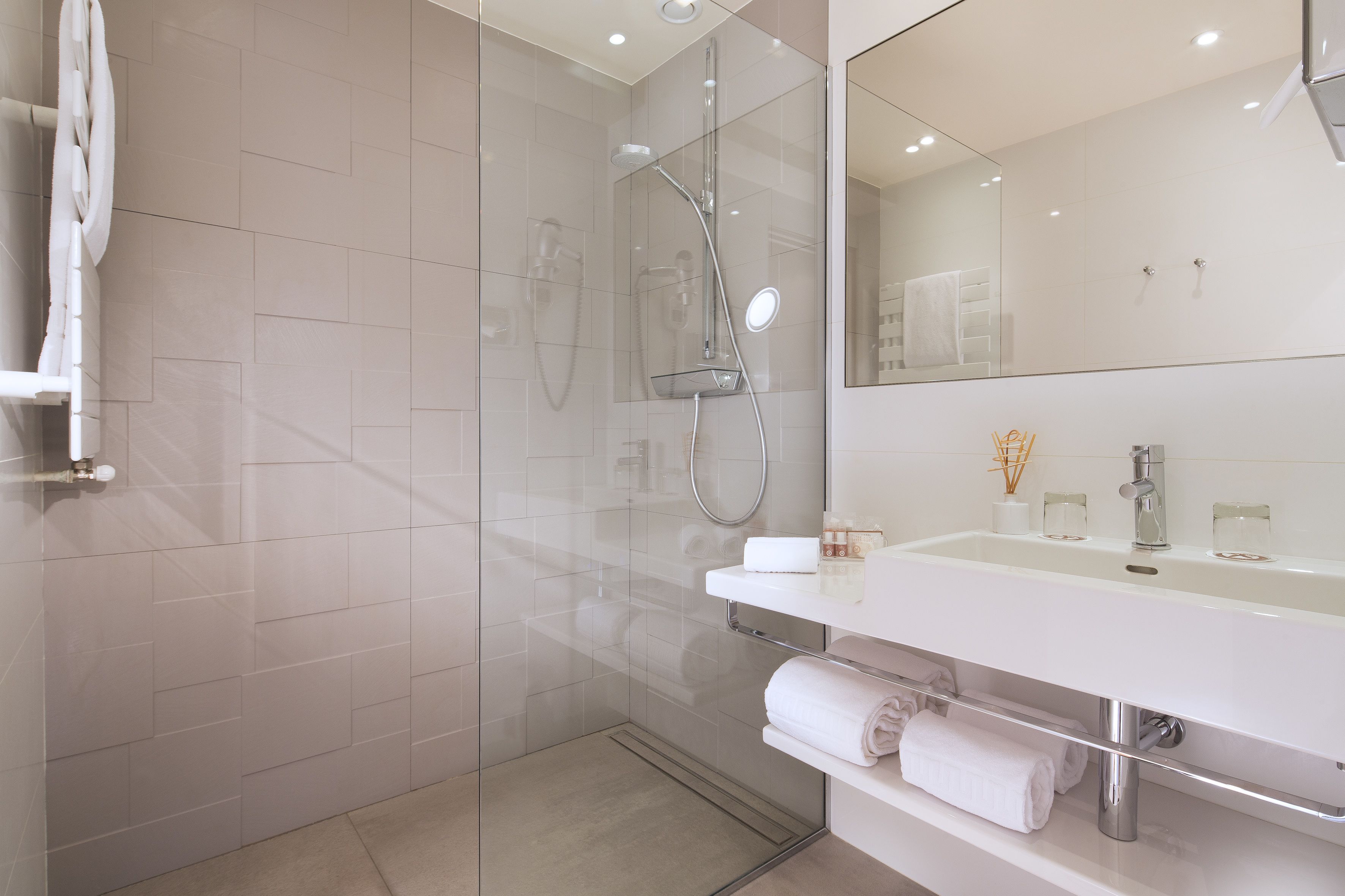 combined shower/bathtub, free toiletries, hair dryer, towels