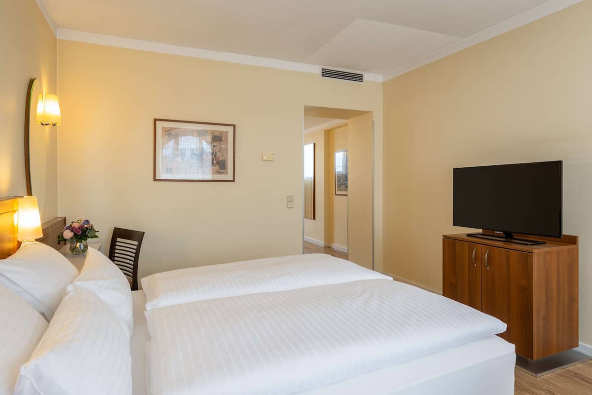 Family Room (2 Adults + 1 Child) | Minibar, in-room safe, desk, soundproofing
