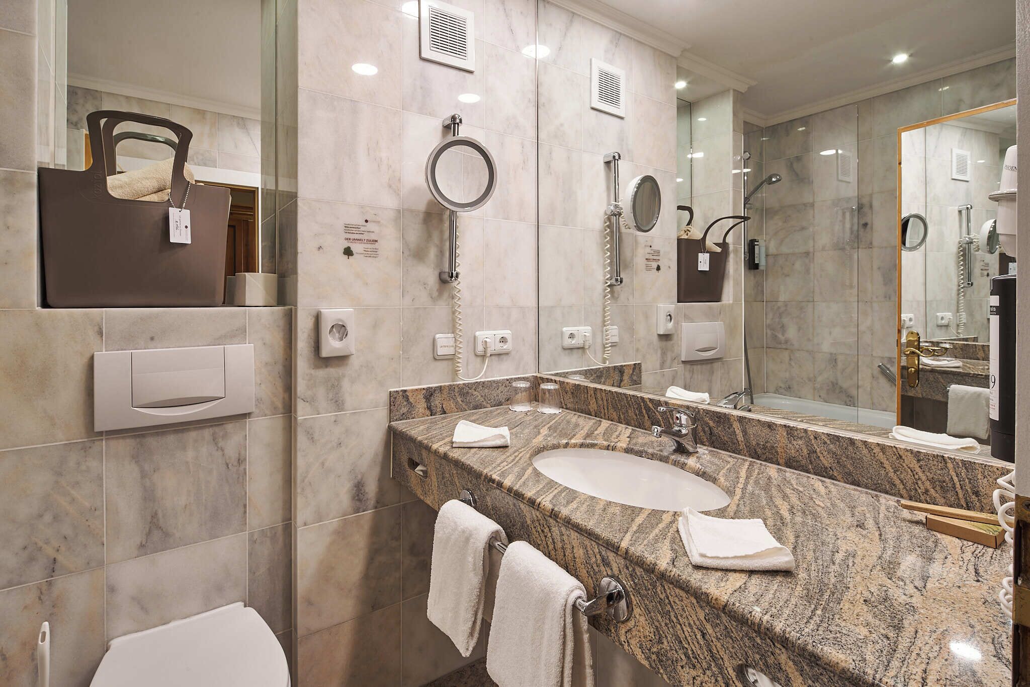 hair dryer, bathrobes, slippers, towels