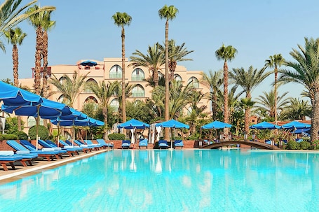 2 outdoor pools, open 9:00 AM to 7:00 PM, pool umbrellas, sun loungers